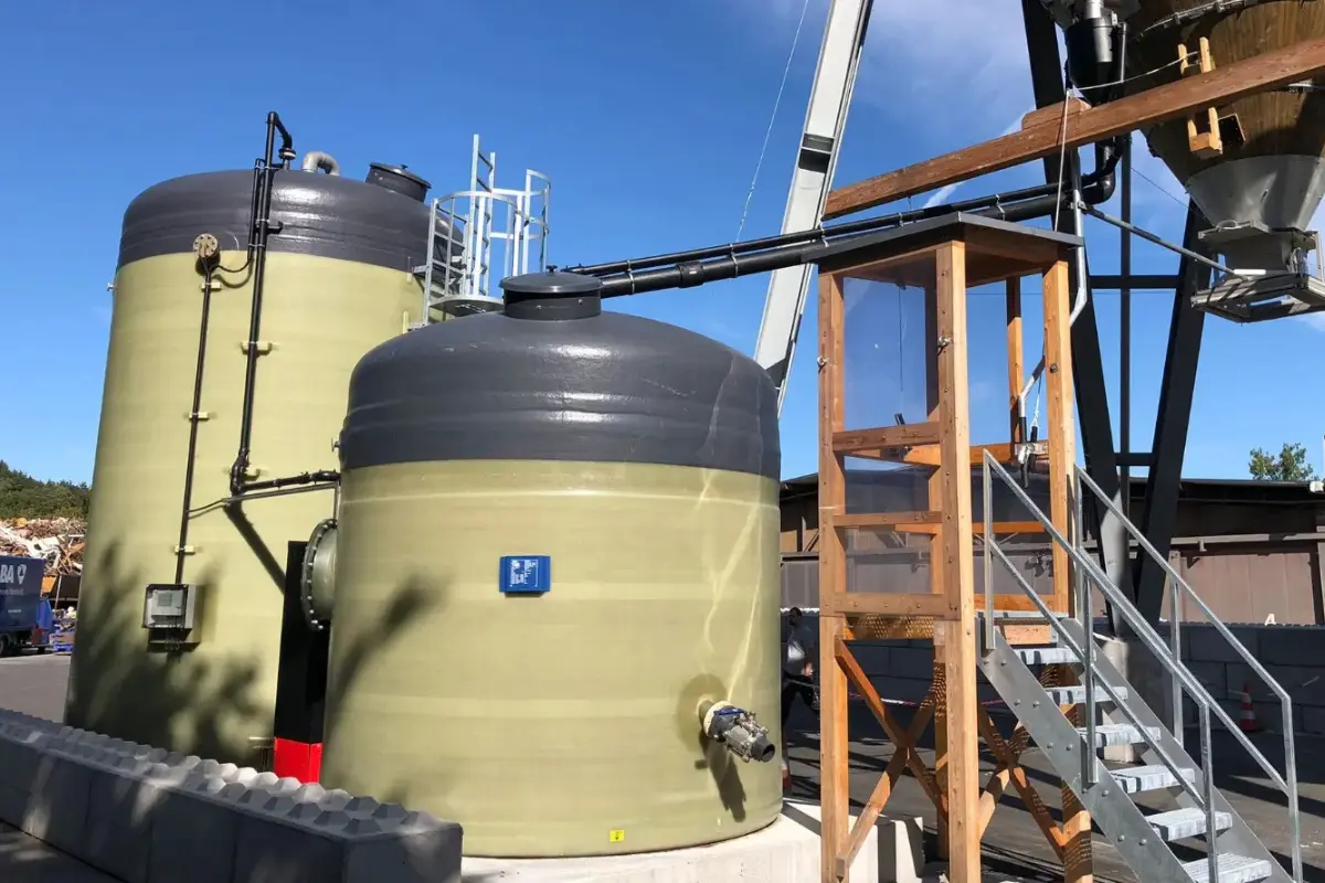 Industrial GRP/FRP vertical storage tanks for brine and salt solutions installed at a processing facility by Global Fiberglass Company.