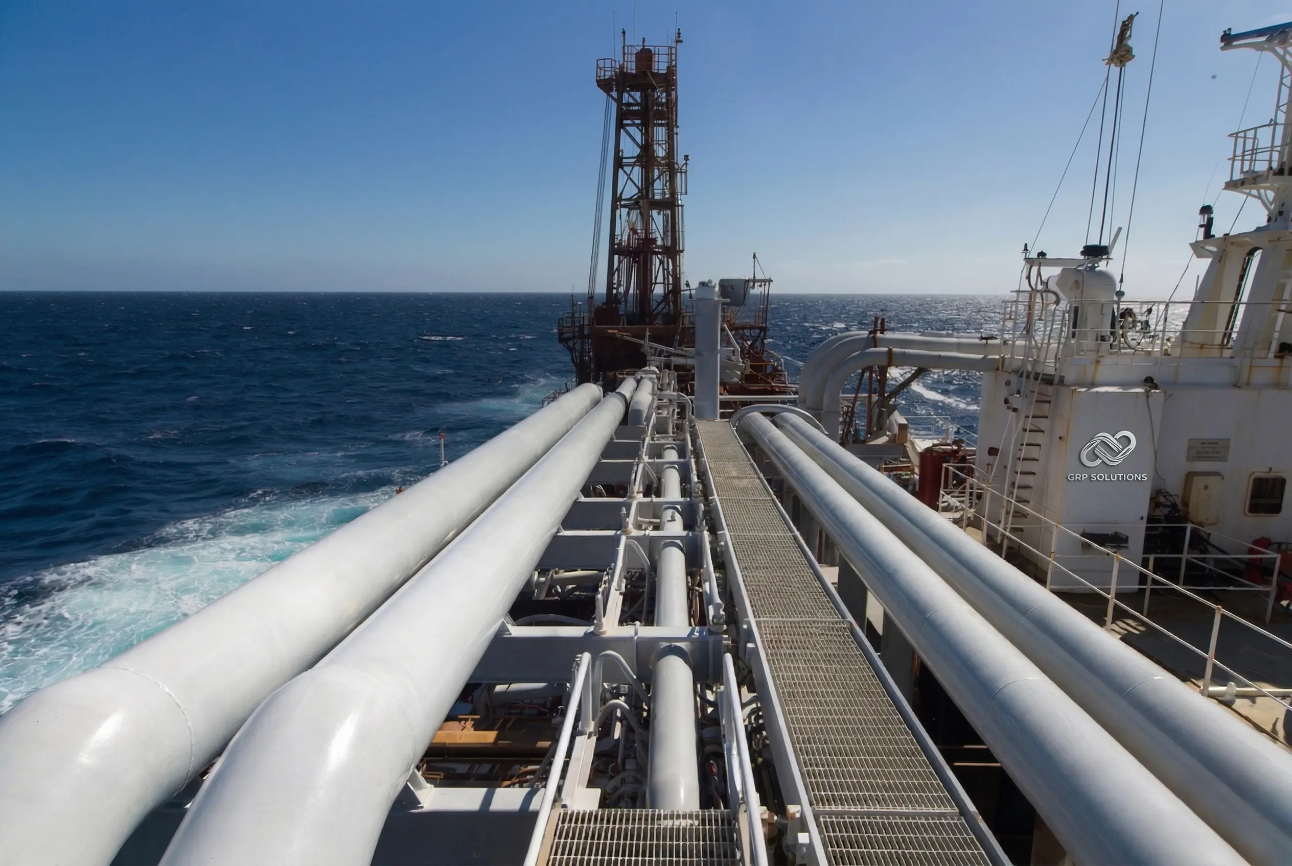 Advanced GRP gratings, handrails, and piping systems installed on an offshore marine platform to prevent corrosion from saltwater and humidity.
